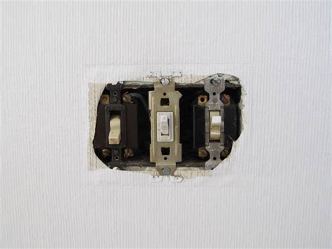 fixing old light switch metal box spring|loose light switch repair kit.